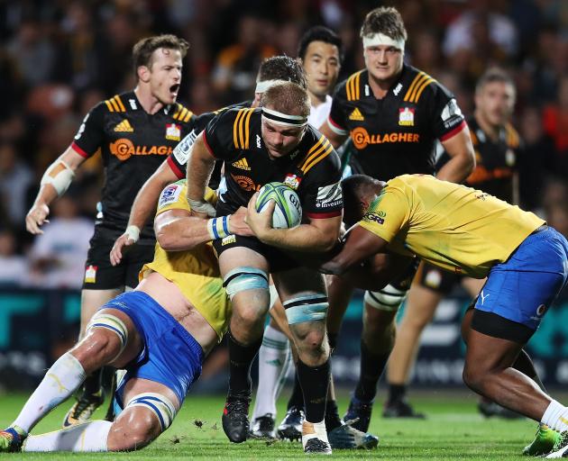 Sam Cane of the Chiefs charges forward during the round five Super Rugby match between the Chiefs and the Bulls. Photo: Getty Images