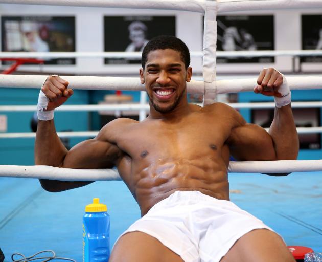 Anthony Joshua revels in the Attention during a media session at the English Institute of Sport...