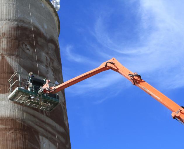 Four grain silos at Transport Waimate's Queen St yard are the canvasses for Waimate artist Bill...