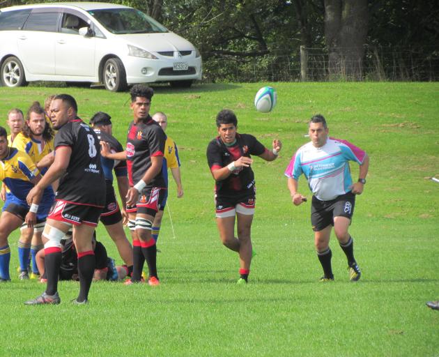 Old Boys halfback Inoke Naufahu clears the ball from a ruck during the Citizens Shield game...