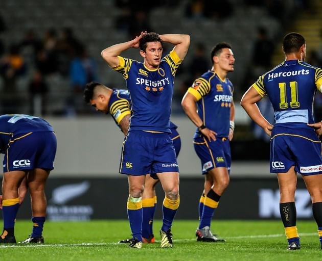 Otago rugby players wearing the team's jerseys, which carry the Speights sponsorship logo. Photo:...