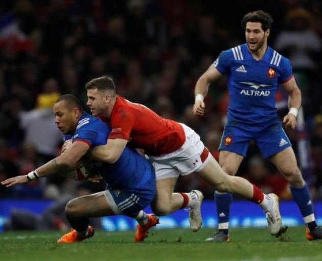 France’s Gael Fickou in action with Wales’ Gareth Davies. Photo: Action Images via Reuters/Paul Childs