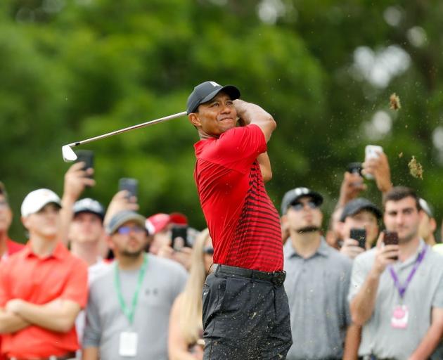 Tiger Woods plays a shot during his most recent round at the Valspar Championship. Photo: Getty...