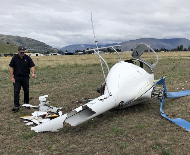 Two people escaped without injury from this helicopter after it crashed at Wanaka Airport...