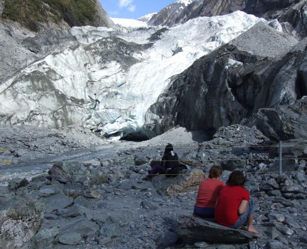 Tourists soak up the atmosphere at Franz Josef glacier. Photo: Matthew Haggart