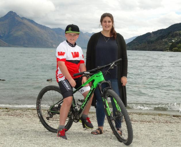 Samuel Muir (11), pictured with teacher Emma Heslin, is cycling the Otago Central Rail Trail for...