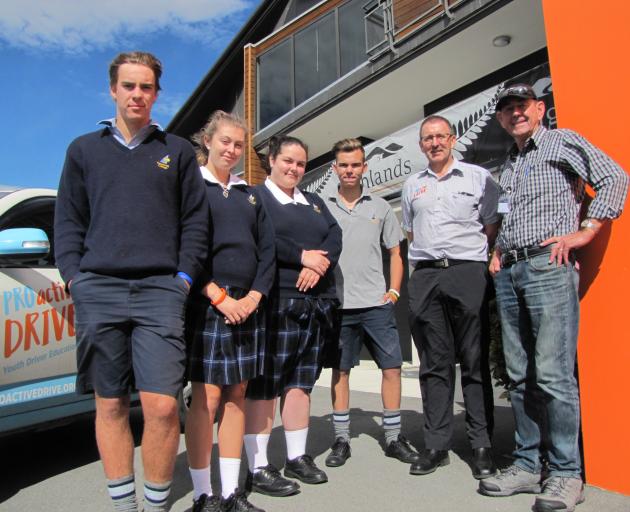 Cromwell College pupils (from left) Liam Grant (16), Georgia Jeffery (16), Monique Bell (16) and Ethan Campher (17), Proactive Drive Youth Education Trust programme manager Tim Hartnell, of Christchurch, and trustee Bill Currie, of Alexandra, take a break