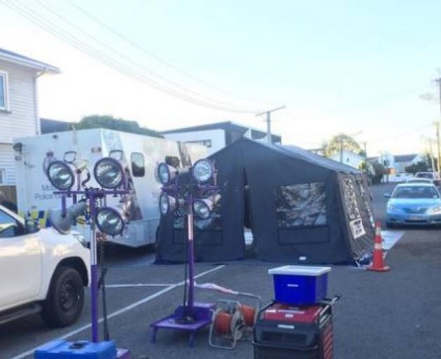 Intense police activity on Exeter St as police piece together the mystery death. Photo: NZ Herald