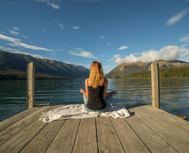 Only some meditations involve sitting quietly with legs crossed. Photo: Getty Images