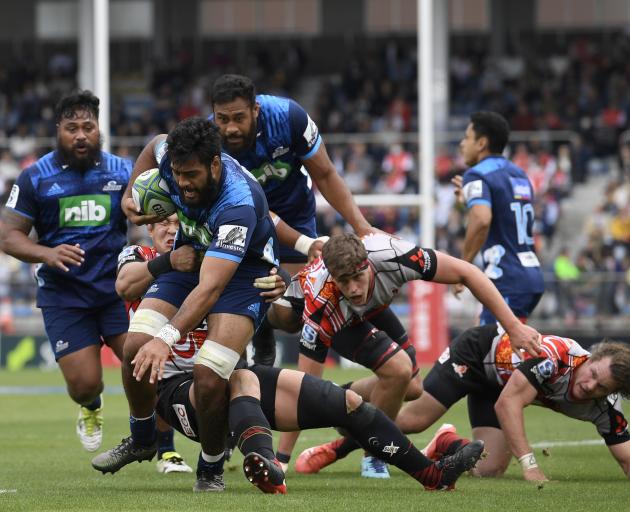 Akira Ioane runs with the ball during during the Super Rugby match between the Sunwolves and the...