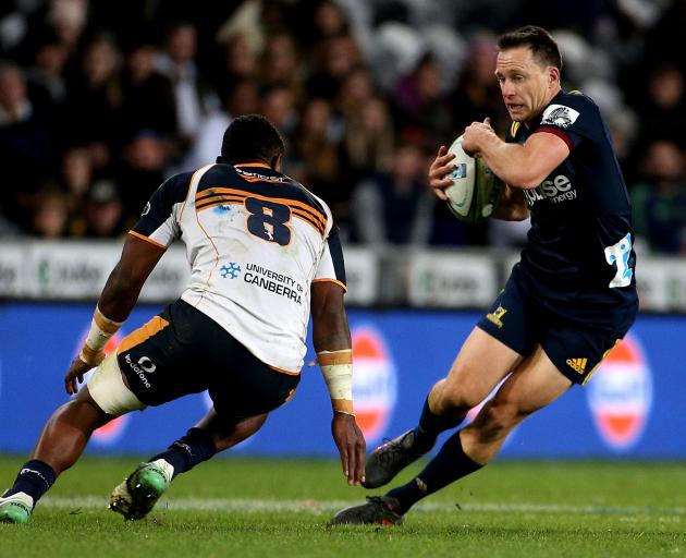 Ben Smith dodges his man during a typically electrifying performance. Photo: Getty Images