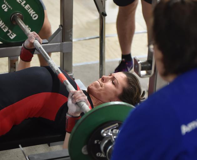 Rachael Bell is about to give the bench press her all at the Southern Provincial Powerlifting...