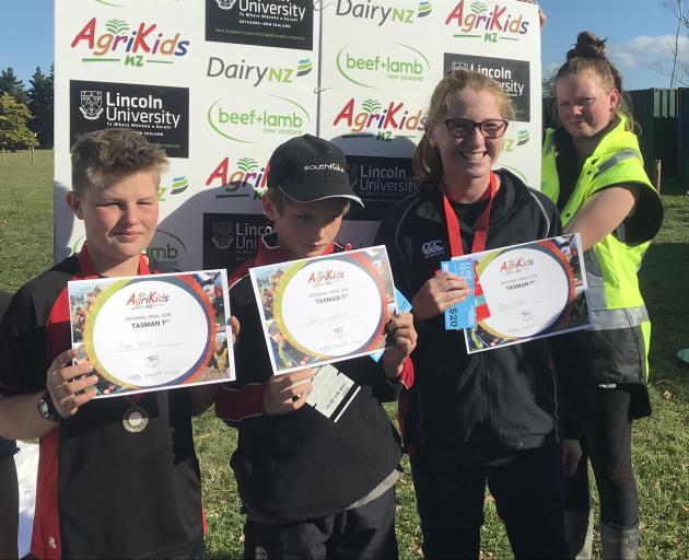 Flynn Shore (left), James Crawford and Hillary Cooper, from Oxford Area School, were thrilled to win the Tasman region AgriKids competition at Templeton, near Christchurch, on April 7. Photo: Supplied