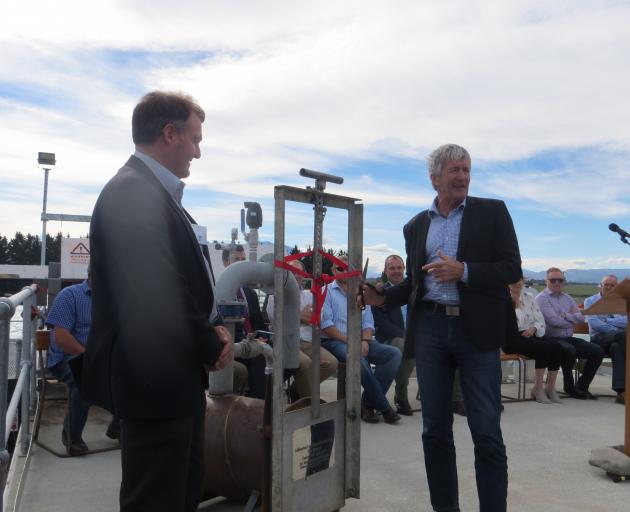 Ashburton Lyndhurst Irrigation Ltd board of directors chairman Colin Glass (left) and Minister of Agriculture Damien O'Connor officially open the ALIL pipe scheme. At the opening, Mr O'Connor said the funding announcement was not the end of irrigation and