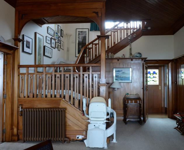 The staircase off the entrance hall leads to six bedrooms and access to the verandas. 