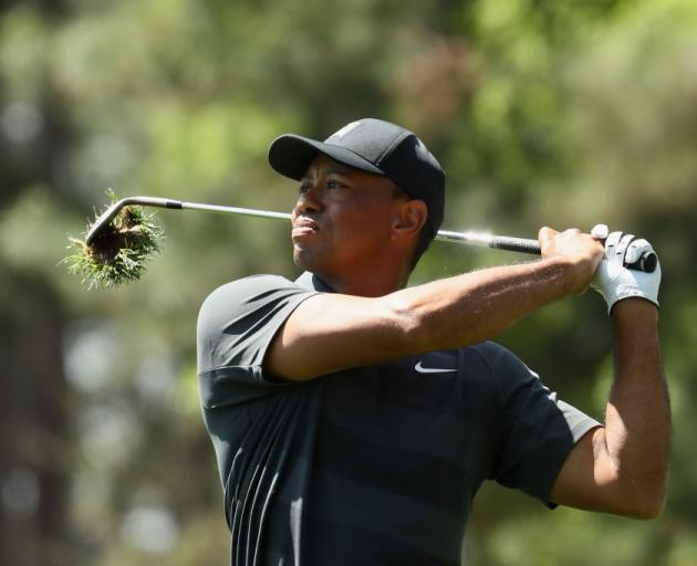 Tiger Woods plays a shot on the ninth hole on day one of the Masters. Photo: Getty Images