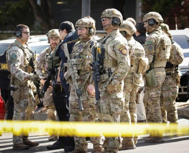 San Mateo County Swat team officers are seen near Youtube headquarters following an active shooter situation in San Bruno, California. Photo: Reuters