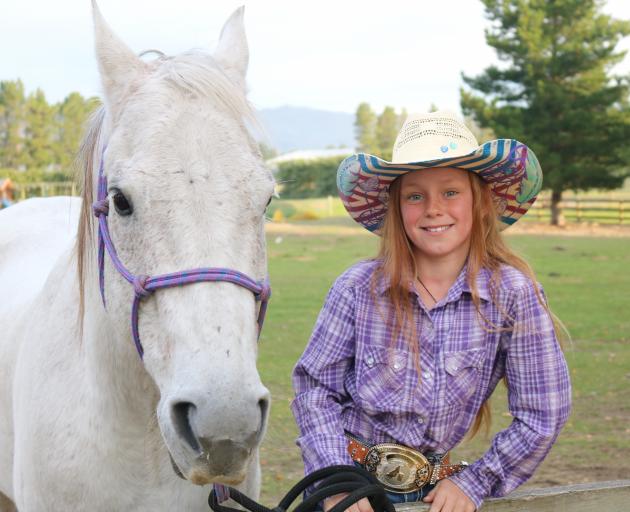 Sky Sanders (10), here with her horse, Cougar, looks forward to competing in an international...