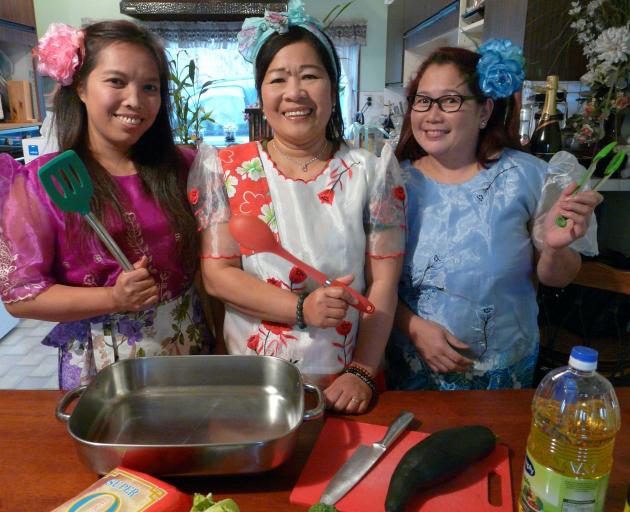 Clutha Culture Feast participants (from left) Mira Matalino, Judy Cross and Maria Hill prepare to...