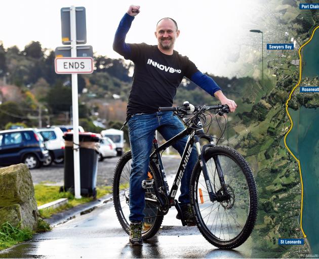 West Harbour Community Board chairman Steve Walker celebrates the news that the St Leonards to Port Chalmers shared cycleway will be completed. Right: The proposed route. Photo: Gregor Richardson