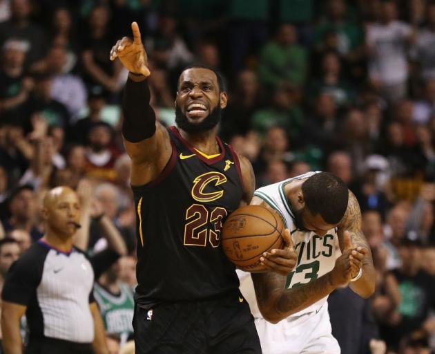 LeBron James celebrates during the game seven win between the Cleveland Cavaliers and Boston...
