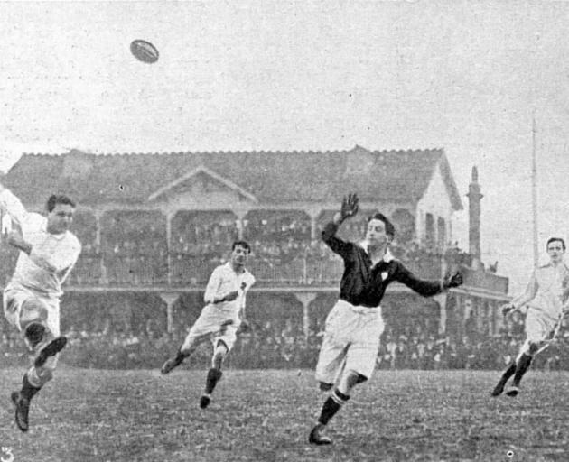 Alex Palmer clears for England against Scotland. Photos: Otago Witness