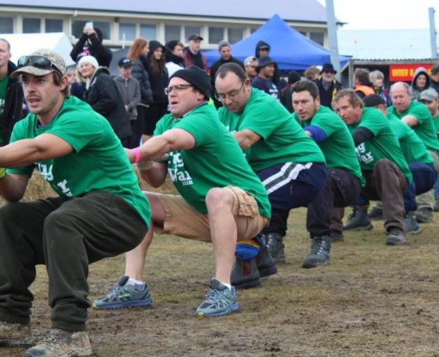The champion team, Grown, competes in a past Sefton Tug of War competition. Photo: Supplied