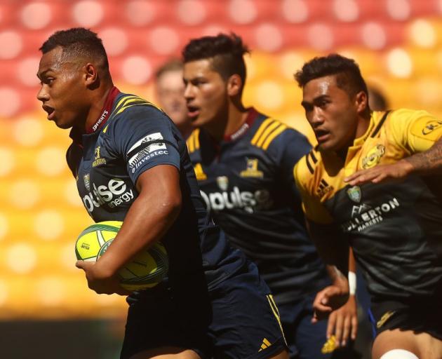 Tevita Li carries the ball as Sio Tomkinson supports him for the Highlanders at the 2017 Brisbane...