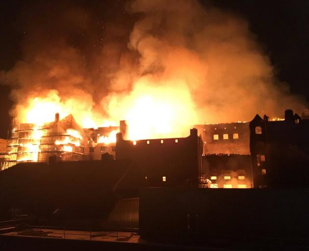 The rear elevation of the Glasgow School of Art is seen on fire. Photo: Reuters via Twitter