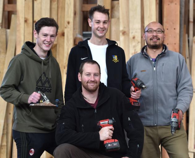 Otago Polytechnic engineering students are fundraising for a trip to Vanuatu, where they will help improve access to clean water and sanitation. Those going include (standing from left) Conrad Sinclair, Cameron Sinclair and Wei Liu, with Josh Peters in fr