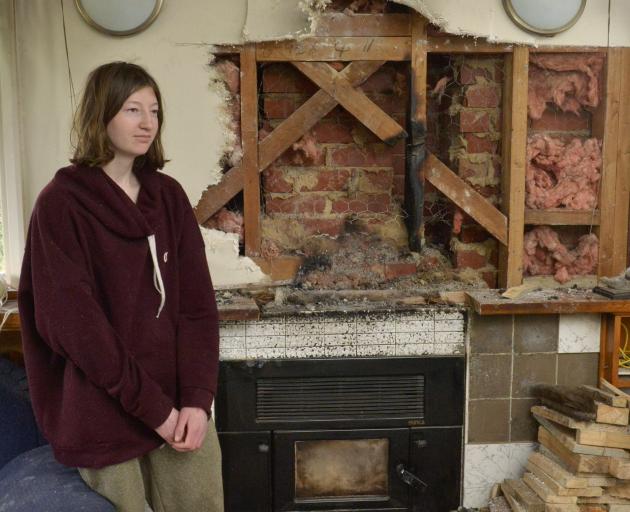 Amelia Seales woke during the middle of the night to find her Normanby flat rapidly filling with...