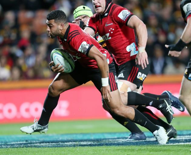 Crusaders first five Richie Mo'unga breaks the Chiefs defence. Photo: Getty Images