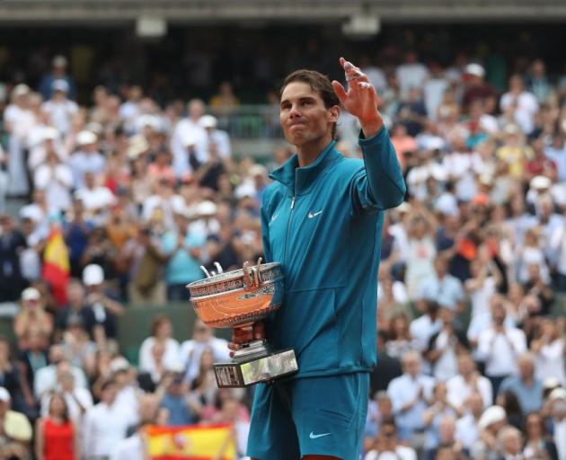 Rafael Nadal with the French Open trophy after winning the final. Photo: Getty Images