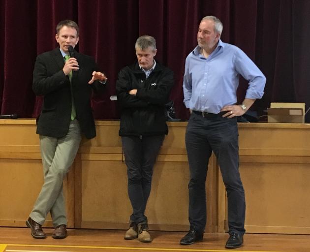Ministry for Primary Industries officials Dr Paul Bingham (left) and David Yard (right), were joined by DairyNZ's Tony Finch to address farmer concerns about Mycoplasma bovis at a meeting at the Amberley Pavilion on June 19. Photo: David Hill