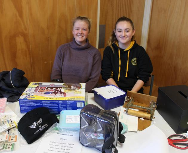 Invercargill Kennington Pony Club members Katelin Stuart (17), left, and Ashleigh Butson (16), sell raffle tickets at the Southern Equine Expo in Otatara recently. Photo: Nicole Sharp