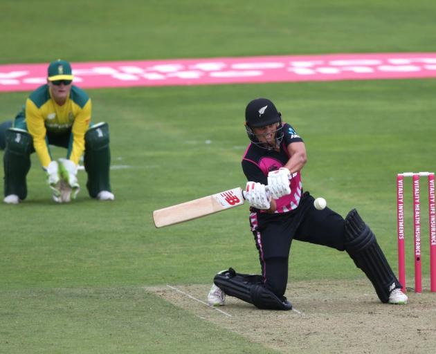 Suzie Bates prepares to smash the ball down the leg side during his century for New Zealand...