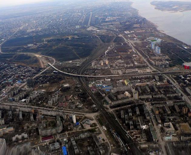 The city of Volgograd, with the Volga River and Volgograd Arena visible, top right. Photo: Wiki...