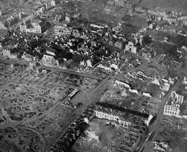 A view from 500 feet of the war devastation at Ypres, Flanders, a city once famous for its linens and lace, its cloth hall and cathedral. - Otago Witness, 12.5.1918