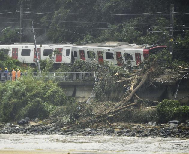 Derailed train caused by a landslide following heavy rain is seen in Karastu. Photo: Reuters