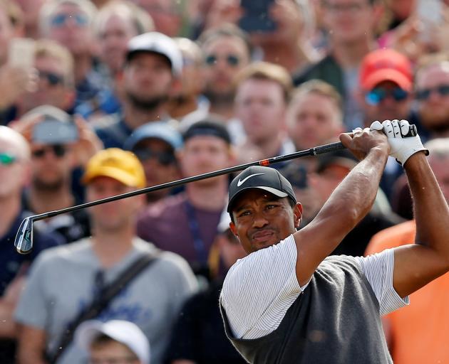 Tiger Woods put in a vintage performance at the British Open, carding 66, and setting up a mouth...