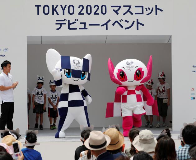 Japan's Olympic swimmer Daiya Seto and Japan's Paralympic canoeist Monika Seryu look on as Tokyo...