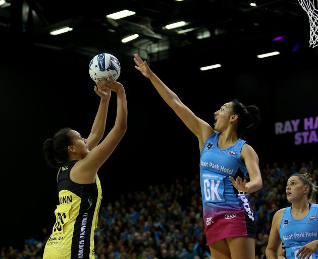 Southern Steel goal keep Courtney Elliot (centre) defends as Central Pulse goal shoot Aliyah Dunn...