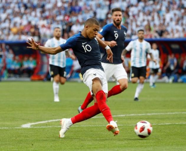 France's Kylian Mbappe scores their fourth goal. Photo: Reuters France's Kylian Mbappe scores their fourth goal. Photo: Reuters