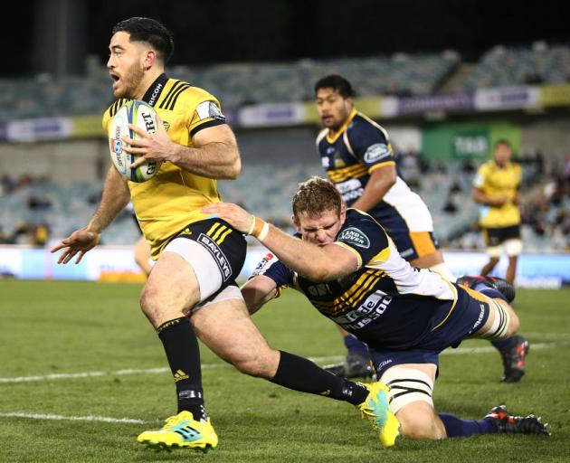 Nehe Milner-Skudder runs the ball during the match between the Brumbies and the Hurricanes in Sydney. Photo: Getty Images