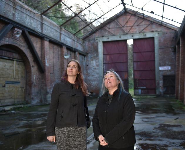 Dunedin City Council acting general manager of infrastructure and networks Leanne Mash (right) and her personal assistant Kimberley Lamond inspect the interior of the former Sims Engineering building in Port Chalmers earlier this week. Photo: Gregor Richa