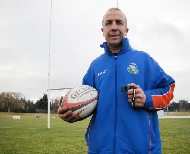 Alexandra referee Gary Smith has an uncertain wait before he officiates in his 200th rugby match....