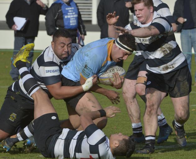 University hooker Kilipati Lea is caught from behind by Southern prop Jone Lesi as Southern...