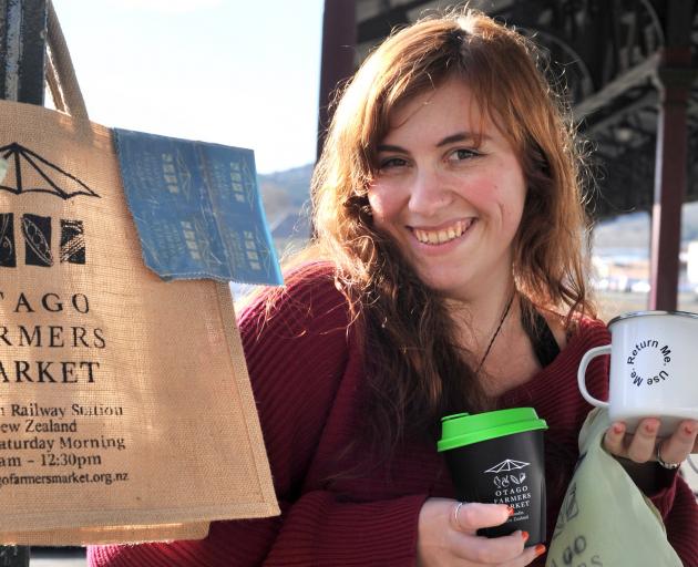 Otago Farmers Market administrator and duty manager Scarlett Michelle with some of the reusable...