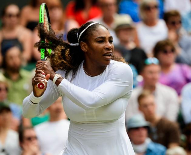 Serena Williams plays a backhand during her semifinal win over Julia Goerges at Wimbledon. Photo:...