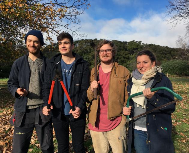 Dunedin Botanic Garden interns (from left) Jonathan Wilson, of Wales, Noud Hoofwijk, of the Netherlands, Spencer Shelton, of the United States, and Julie Mary, of France, take a break from work on Tuesday. Photo: Shawn McAvinue 